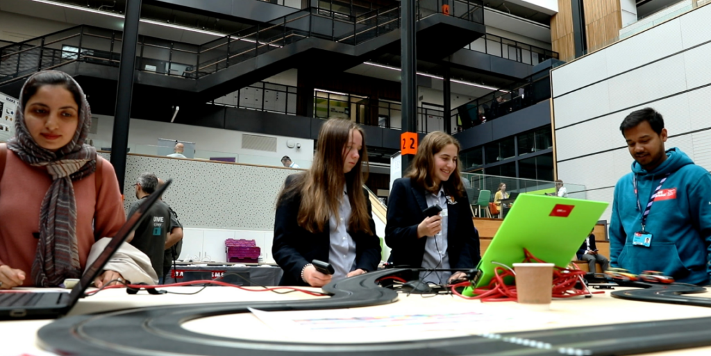 Children playing a game at an unlock cyber event.