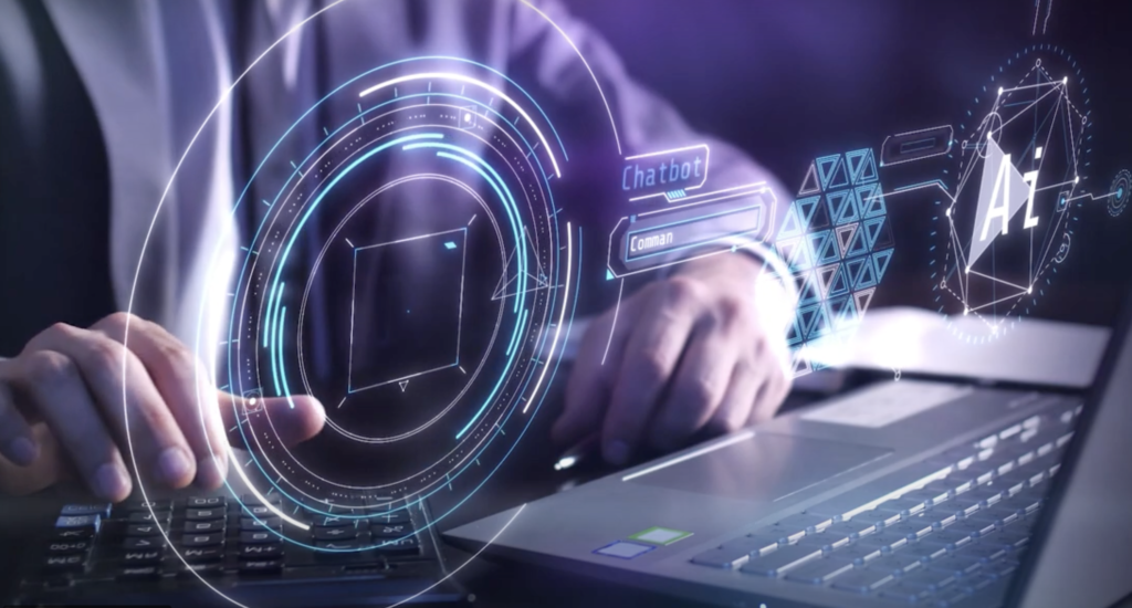 Person accessing computer with holographs of data.